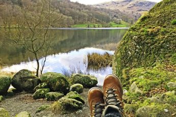 A pair of walking boots overlooking Grasmere in the Lake District - photo Zoe Dawes